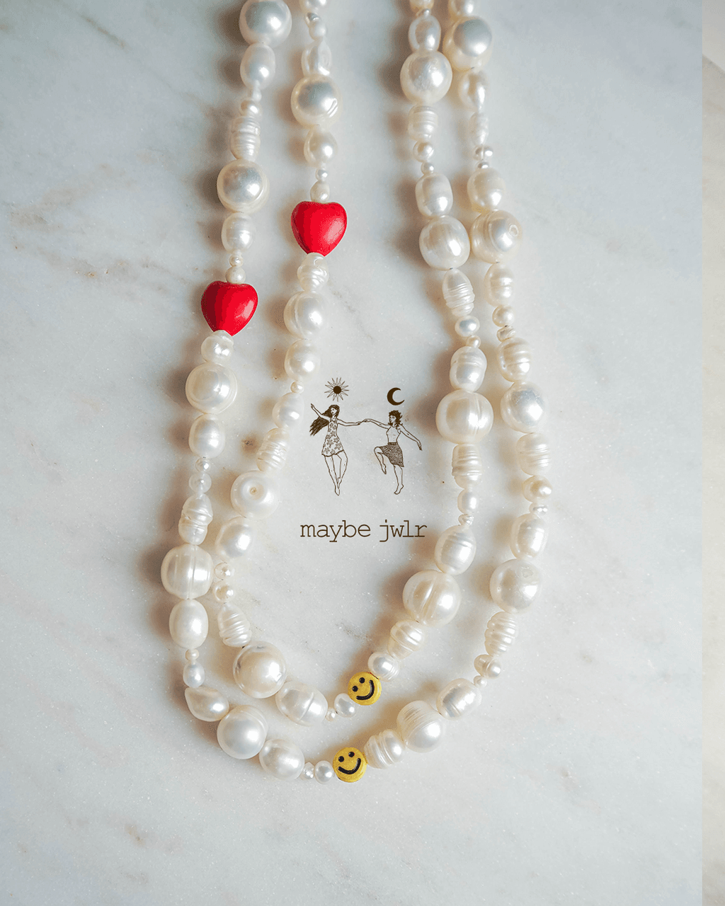 Nieregularny naszyjnik z pereł z sercem i uśmiechem