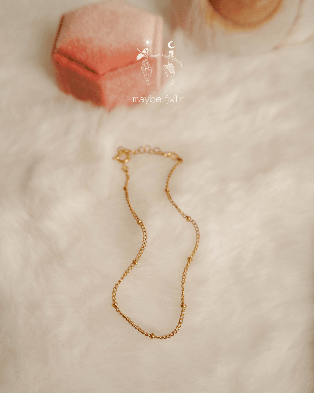 Bransoletka ze złotymi kuleczkami