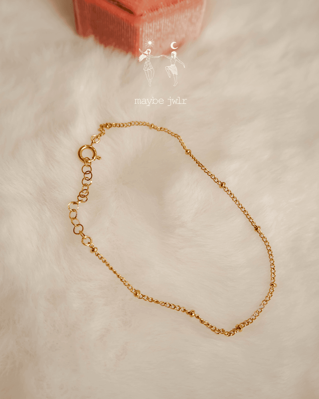 Bransoletka ze złotymi kuleczkami