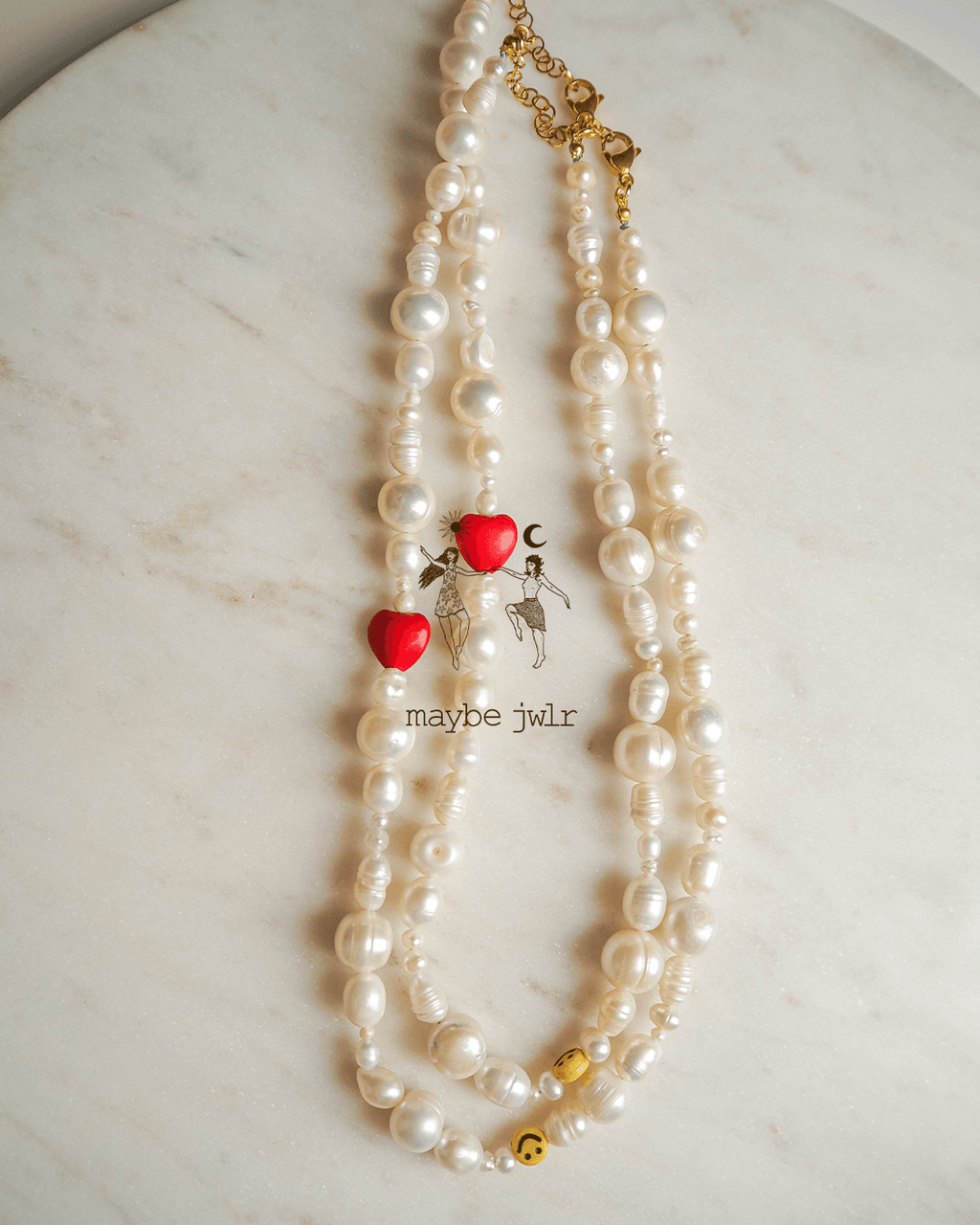 Nieregularny naszyjnik z pereł z sercem i uśmiechem