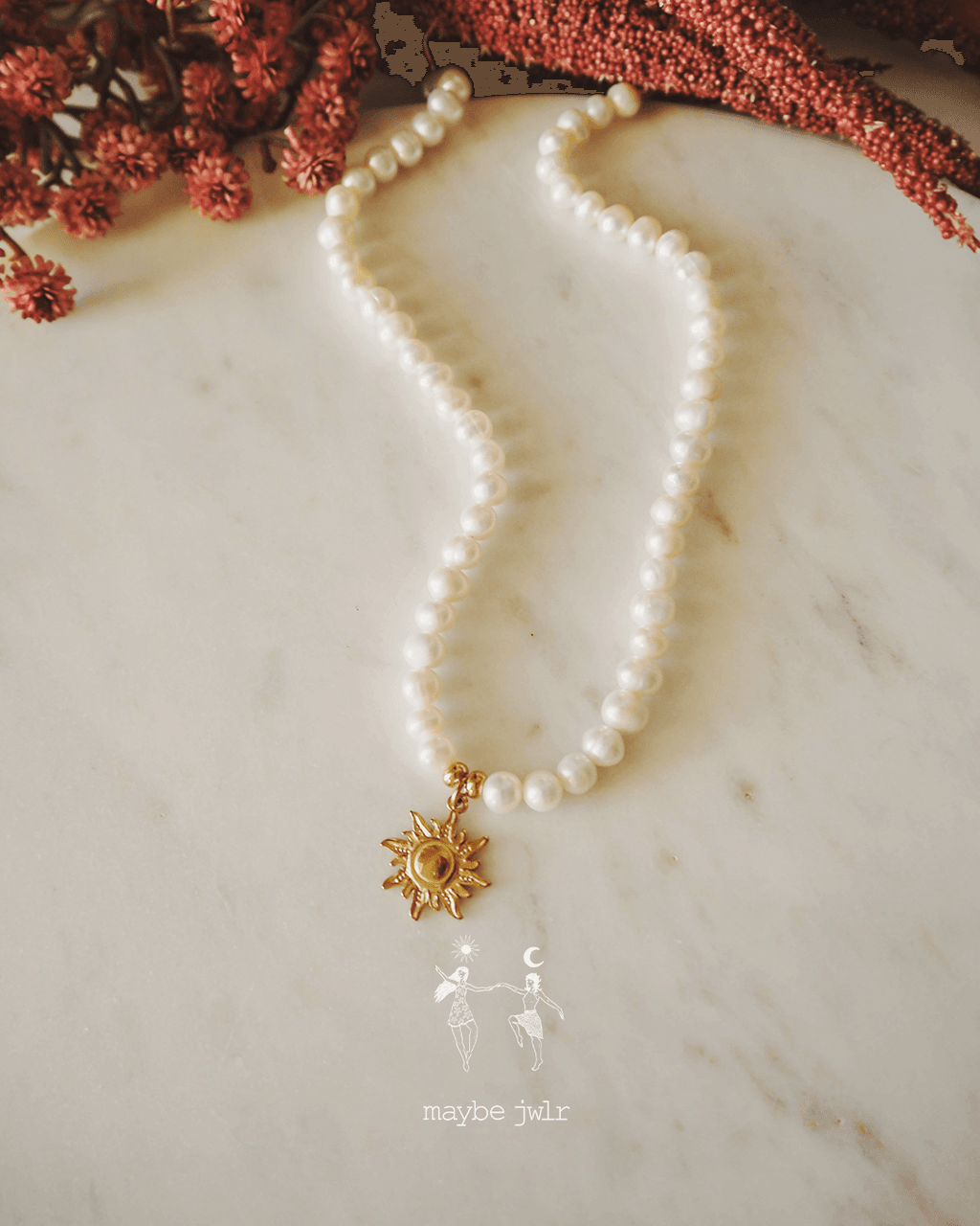 Naszyjnik z pereł ze słoneczkiem