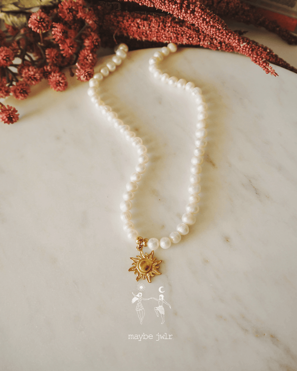 Naszyjnik z pereł ze słoneczkiem