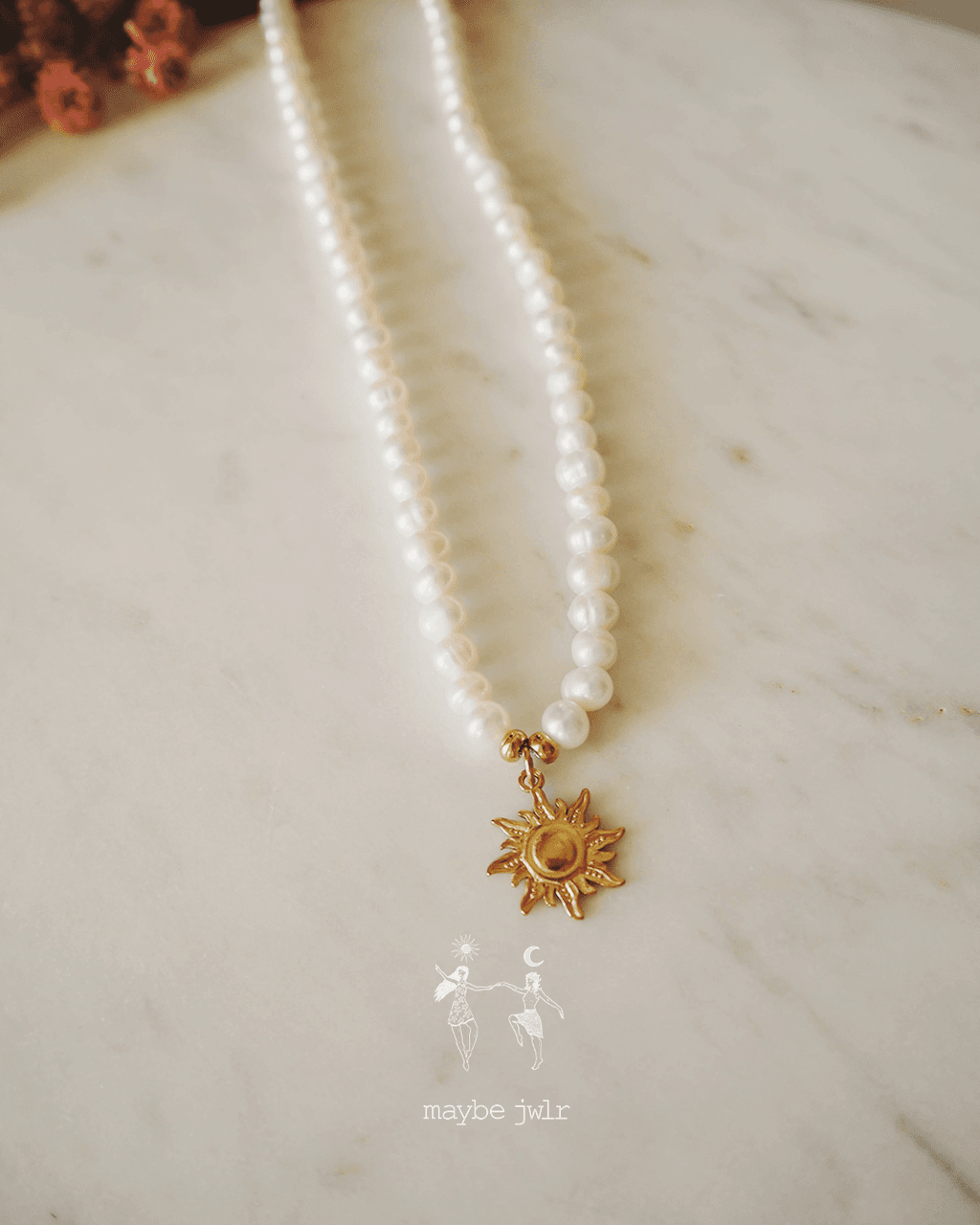 Naszyjnik z pereł ze słoneczkiem