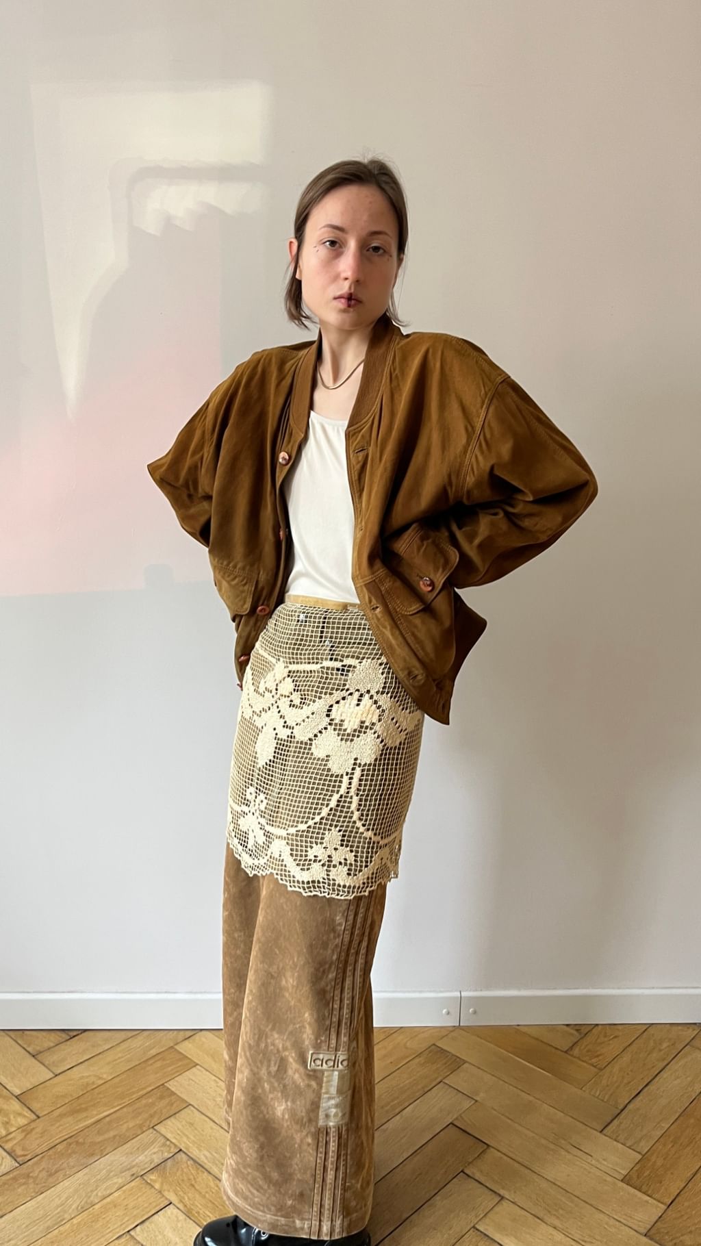 Skórzana bomberka zapinana na guziki