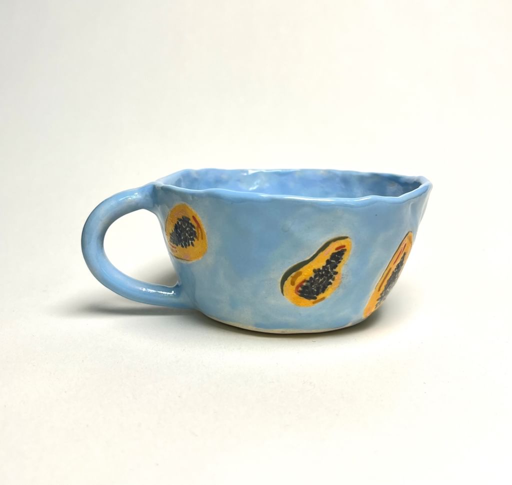 Filiżanka w malowane papaje