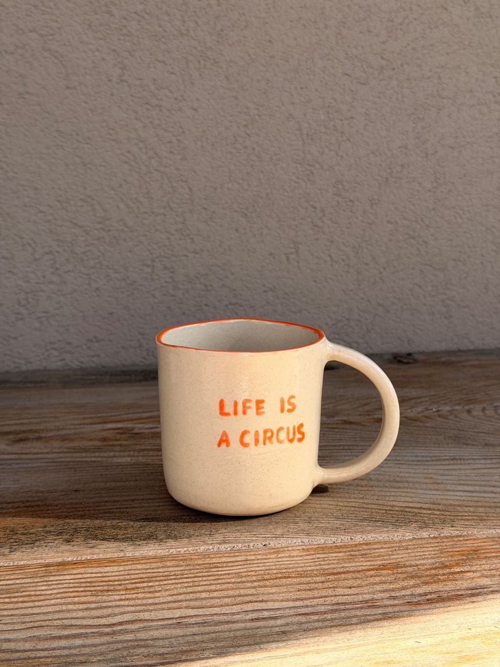 Kubek " Life is a circus " pomarańczowy 