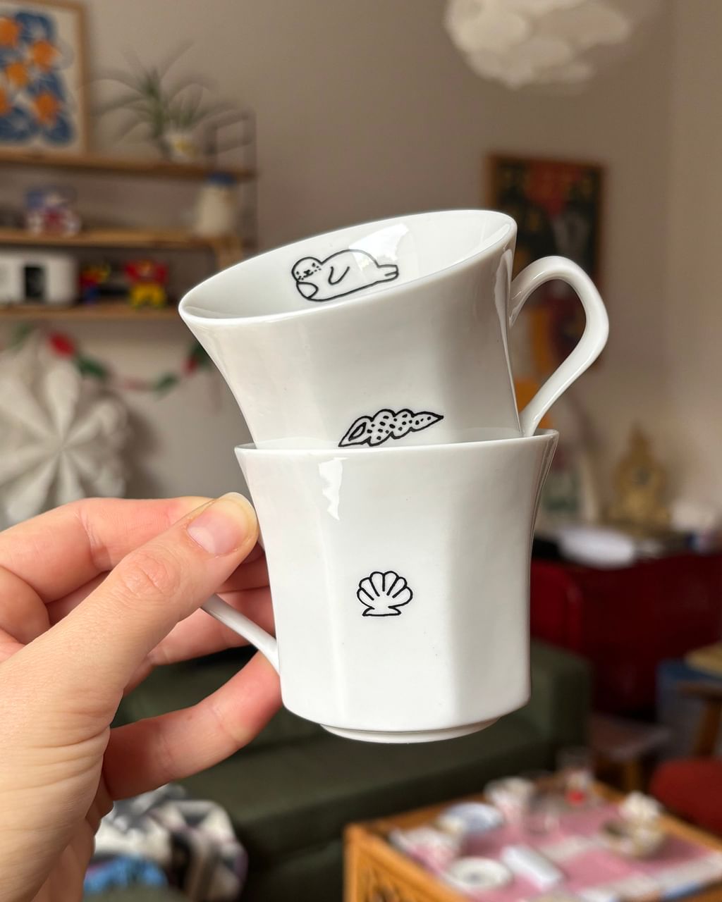 Zestaw 2 filiżanki z foczką i muszelkami