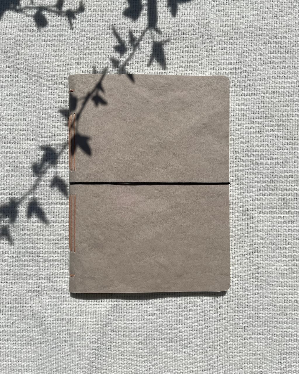 notes szyty na grzbiecie